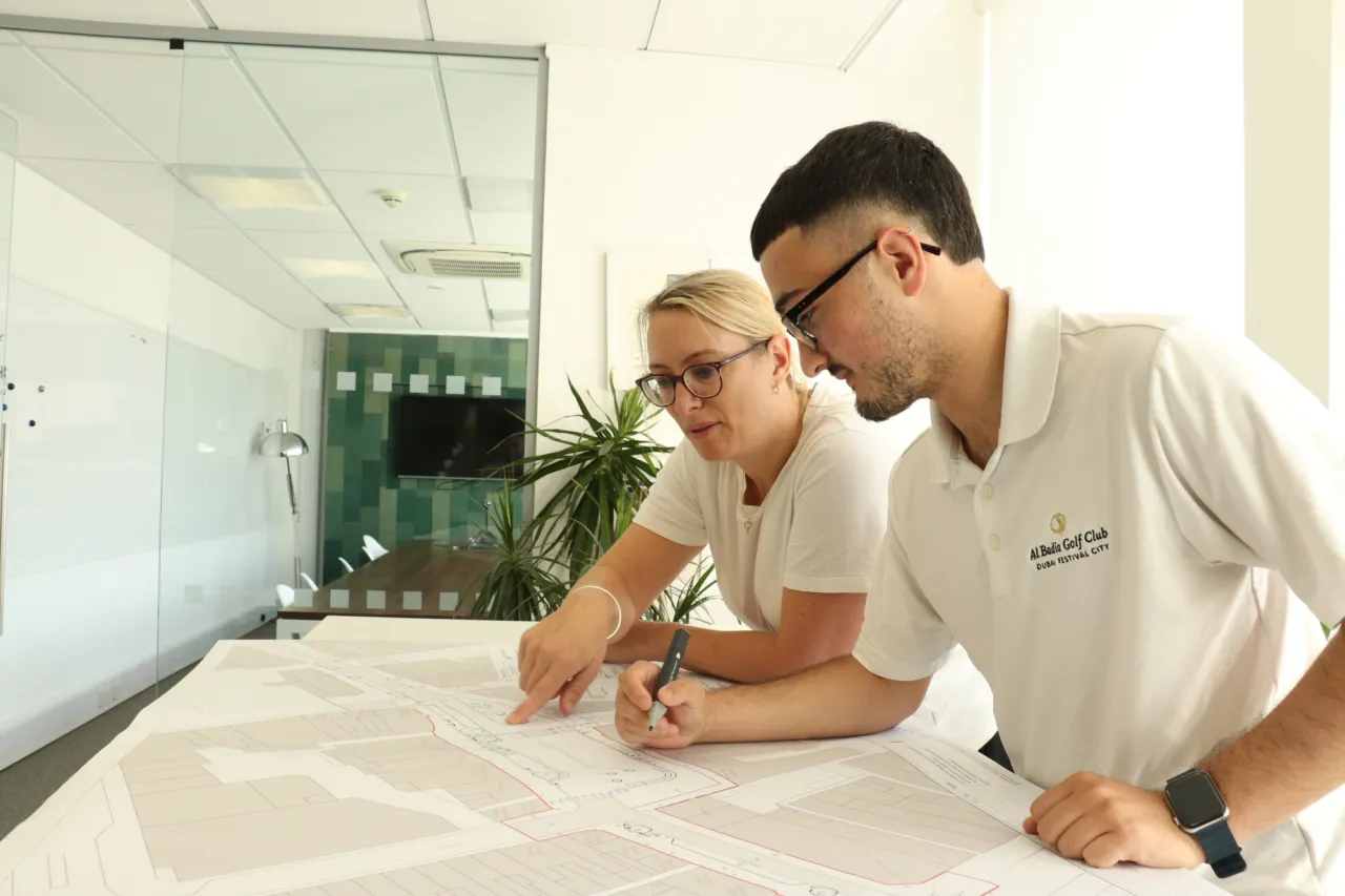Two landscape consultants marking up a sketch in Gillespies' Leeds studio