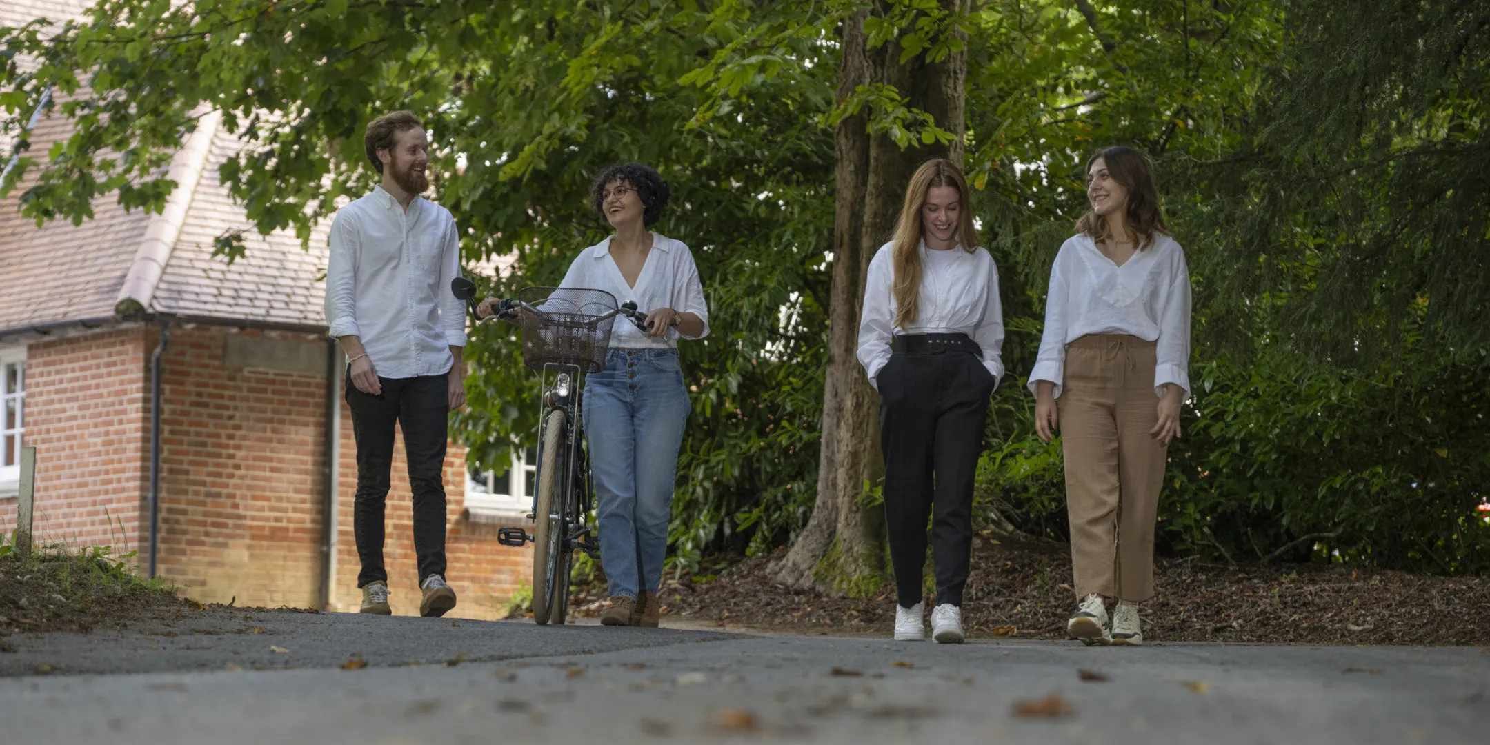 Four landscape consultants walking outside Gillespies' Oxford studio