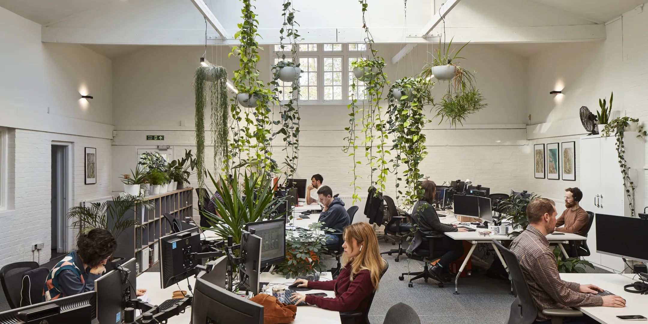 Landscape architects at Gillespies Oxford studio sat at desks working