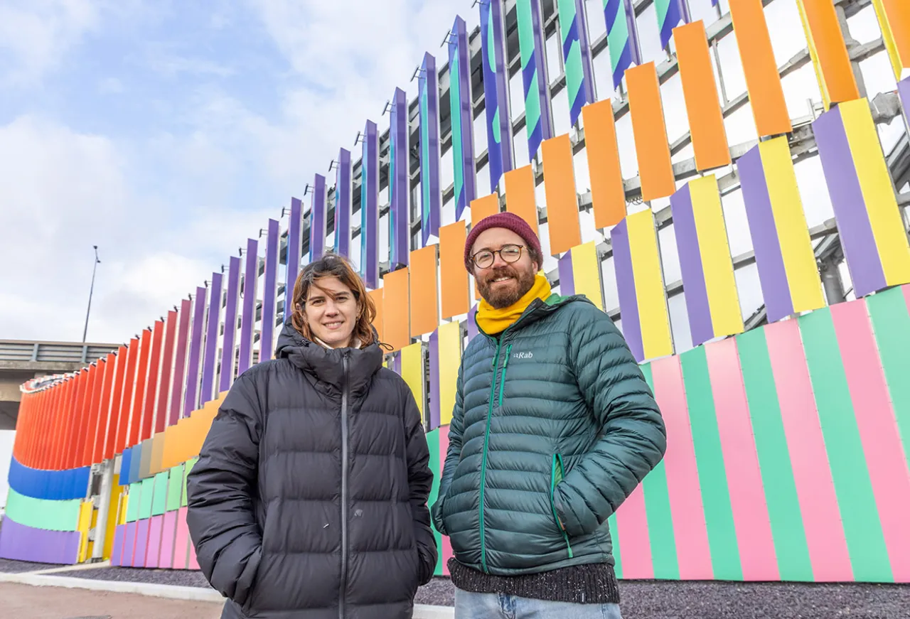 Two Gillespies people at the artwork unveiling