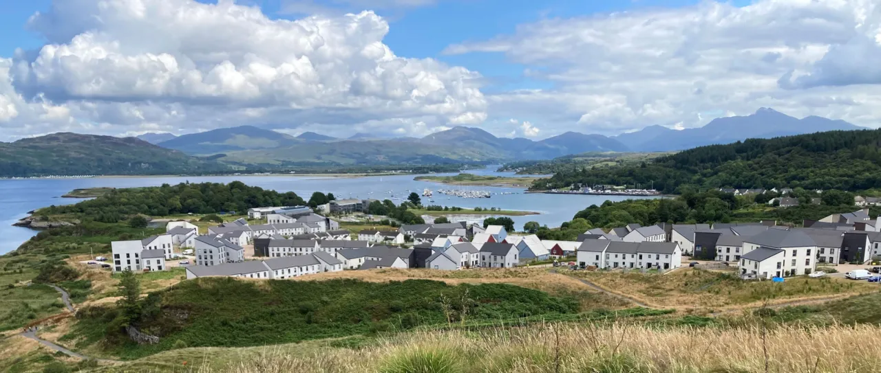 Panoramic view of the new housing and landscape as part of phase 3 of Dunbeg in the Scottish Highlands