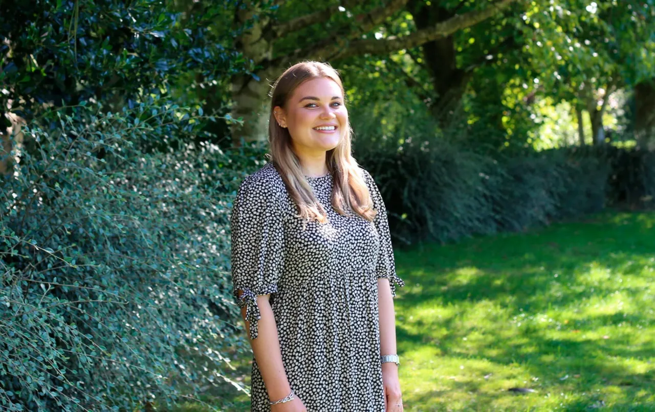Senior Landscape Architect, Bethany Keel, standing in a green parkland setting