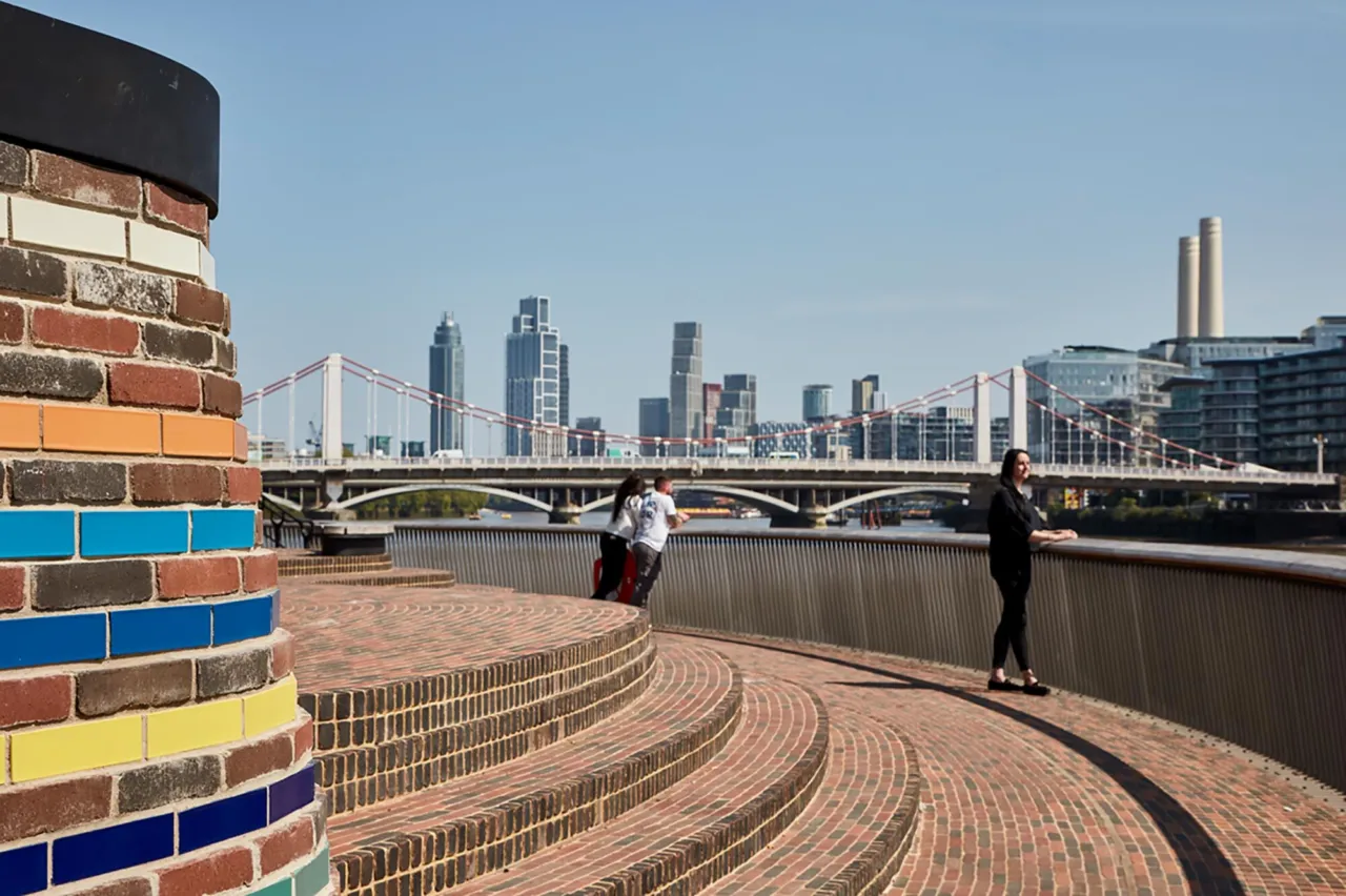 Chelsea Quay public realm with curved brick seating overlooking the Thames, part of the Thames Tideway project