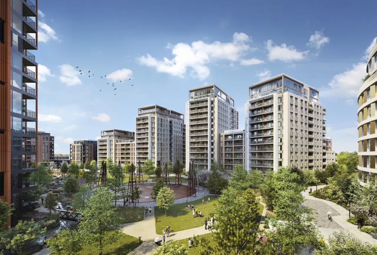 Modern residential development at King’s Road Park with lush green public realm, trees, and integrated landscape architecture design.