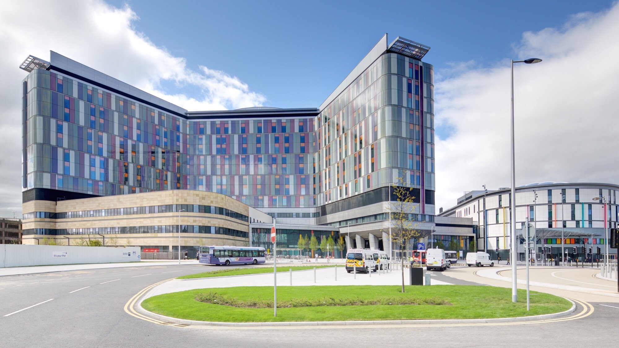 "Queen Elizabeth University Hospital Glasgow with modern architecture and landscaped public realm design.