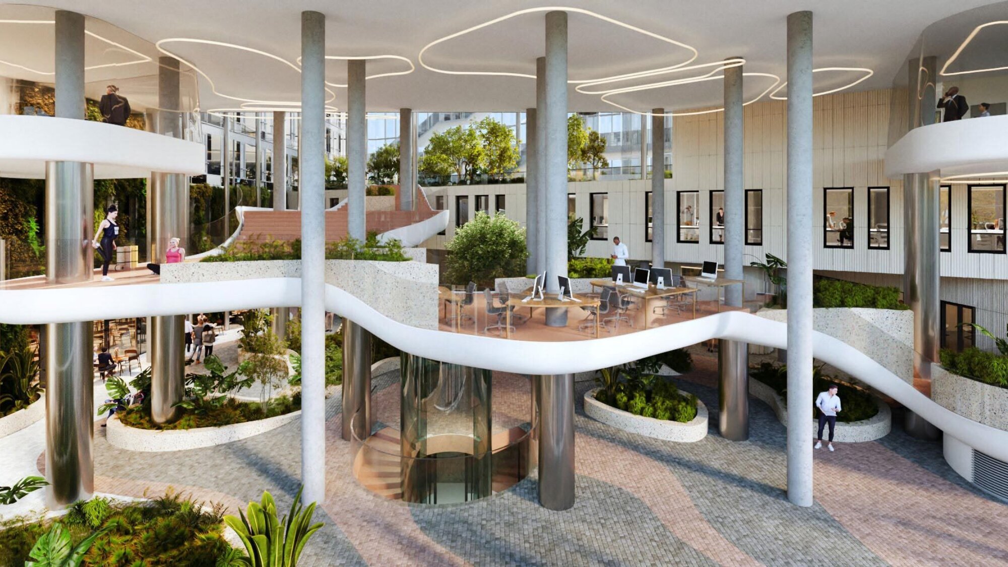 Interior of Danube House, an office development in Prague with lush internal planting, floating staircase and sculptural architectural design.