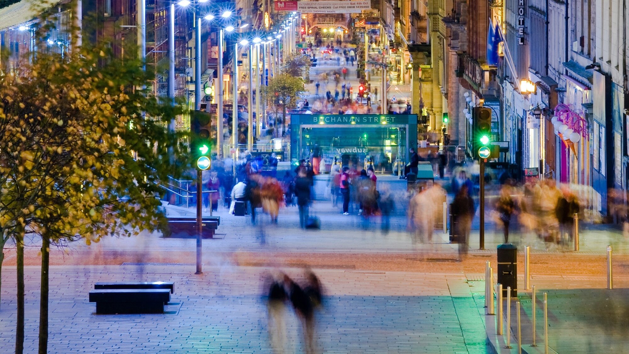 Evening streetscape of Buchanan Street Glasgow with urban lighting, pedestrian-friendly paving, and landscape architecture design.