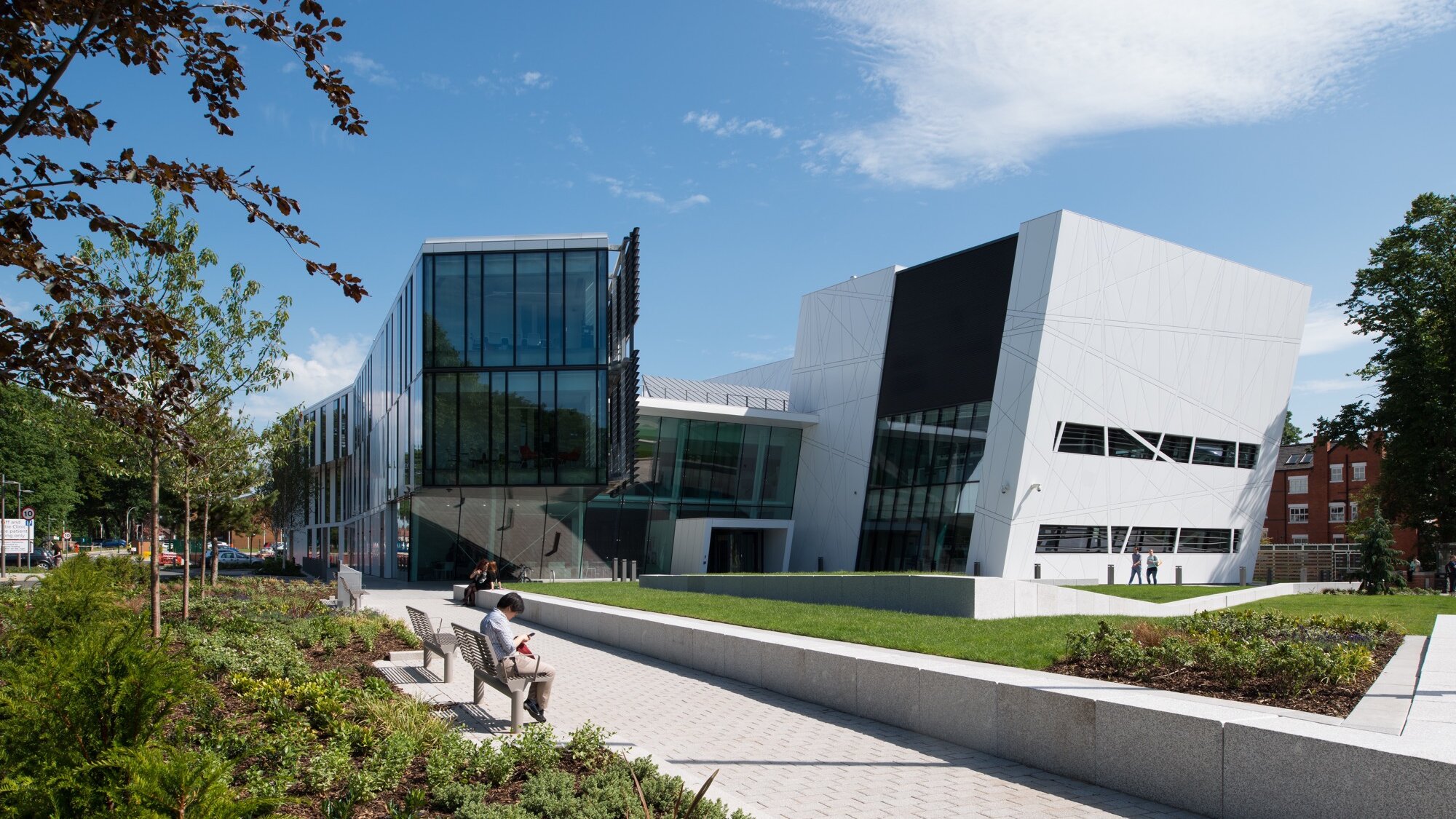 Manchester Cancer Research Centre landscape design with modern planting, accessible pathways, and sustainable urban green space.