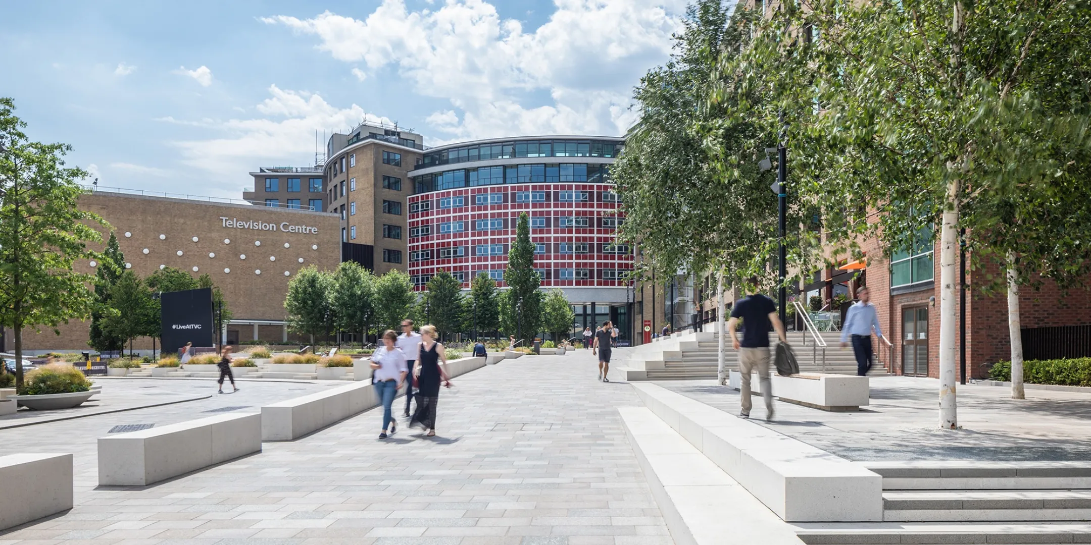 Television Centre public realm with modern paving, seating, trees, and landscape architecture enhancing urban plaza design London.