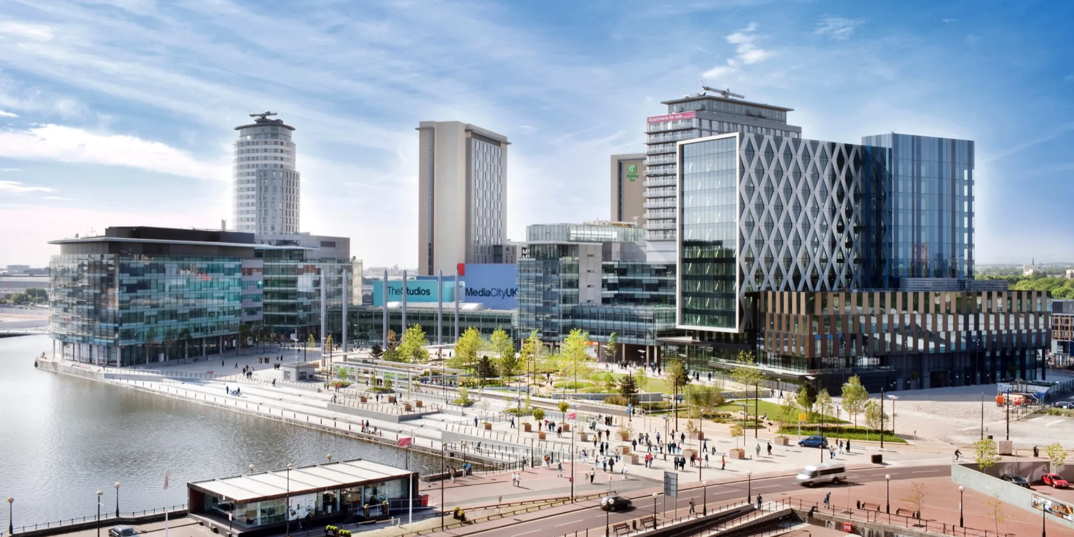 Contemporary waterfront landscape design by Gillespies for MediaCityUK, with public realm, urban planting, and pedestrian-friendly open spaces.