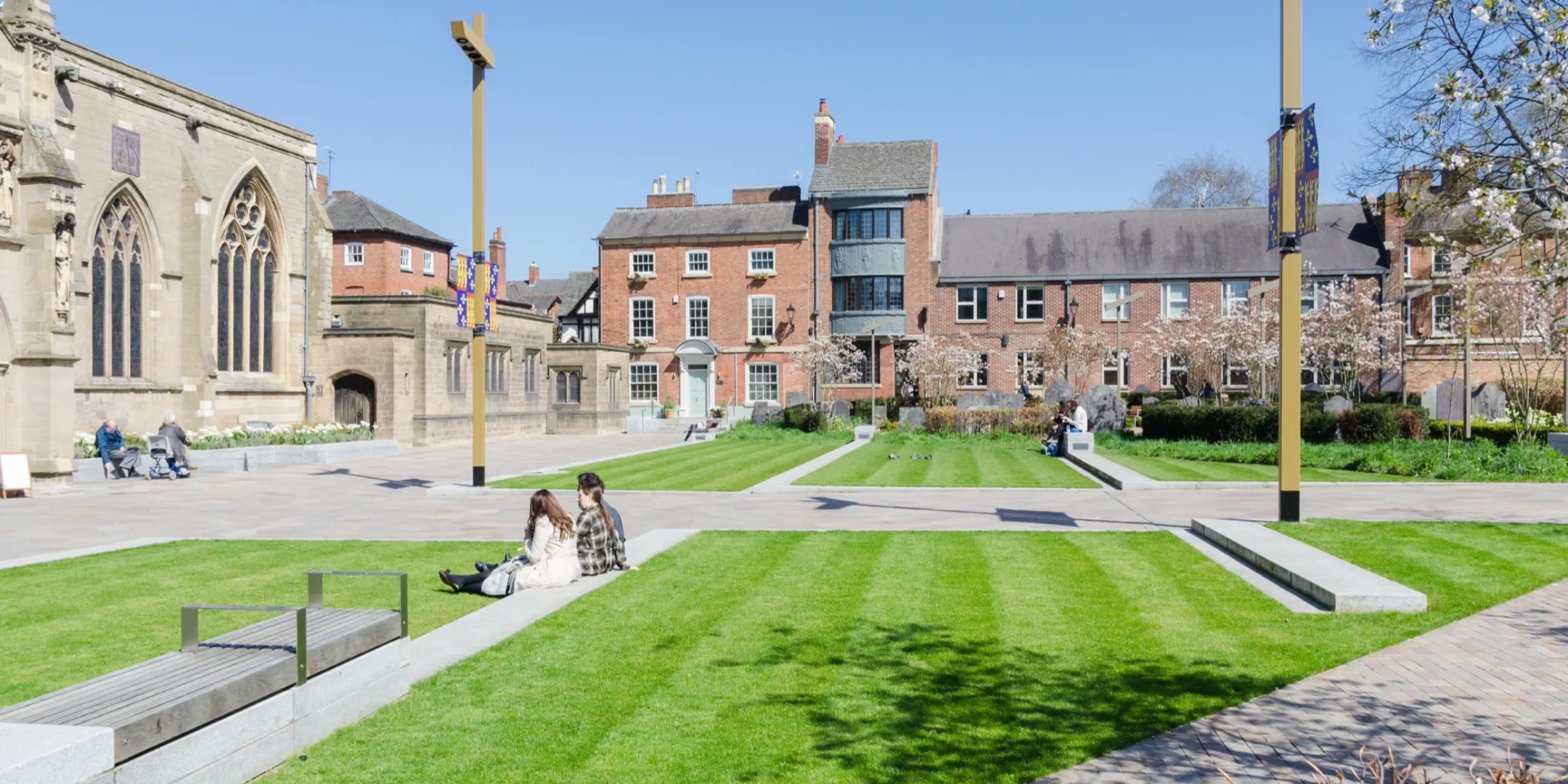 Leicester Cathedral Gardens with formal lawn, seating, and historic setting designed for civic landscape architecture.
