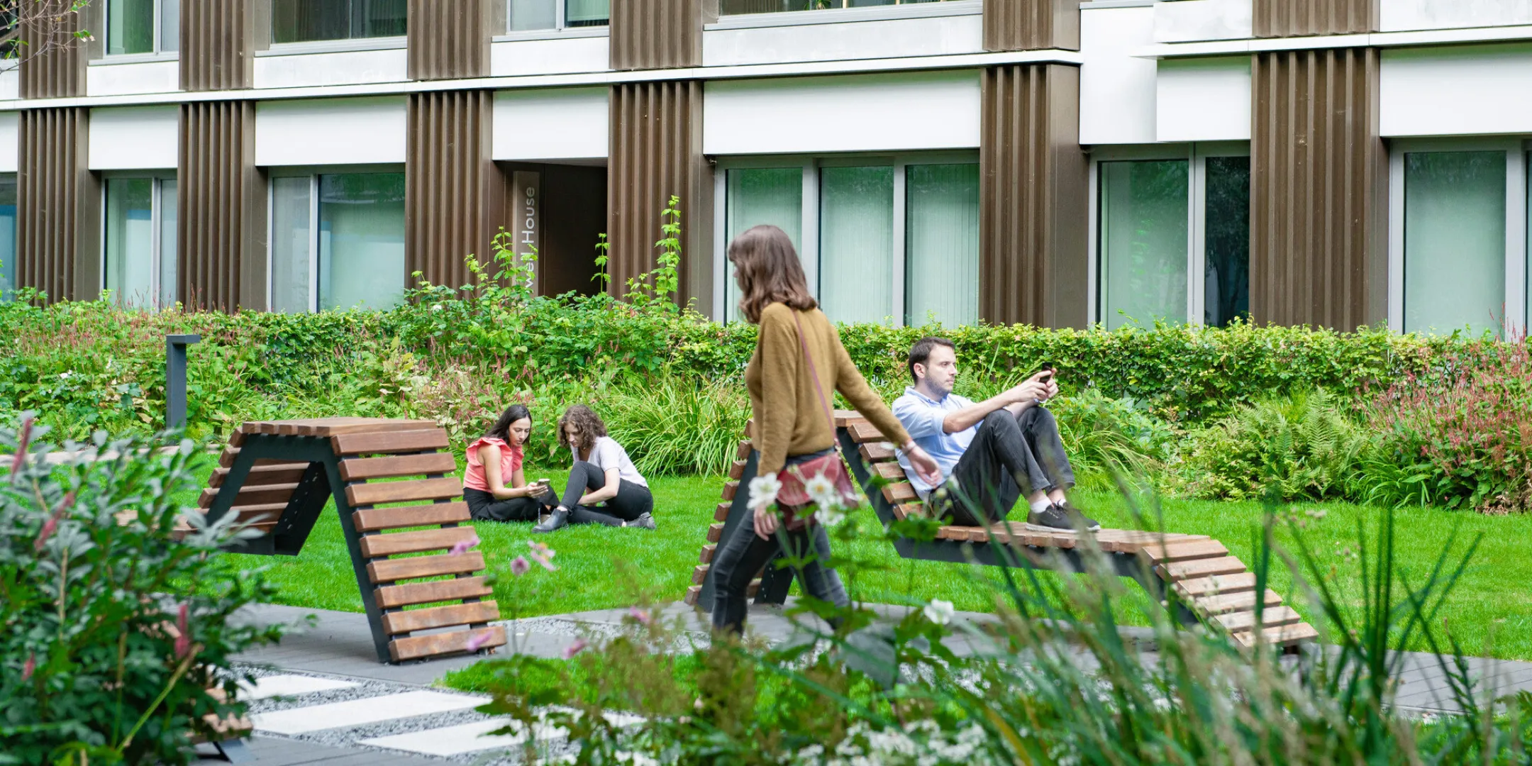 Prince of Wales Drive residential courtyard with communal lawn, seating, and biodiverse planting showcasing contemporary urban landscape architecture