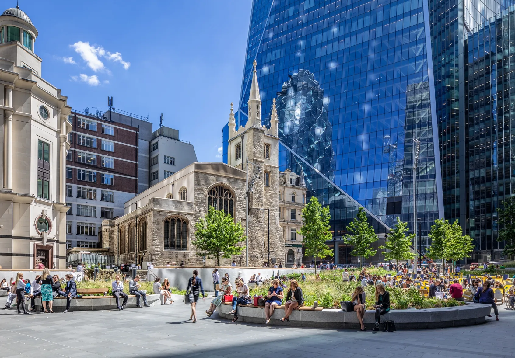St Helen’s Square landscape architecture blends historic church, modern planting, and curved seating in vibrant public realm design.