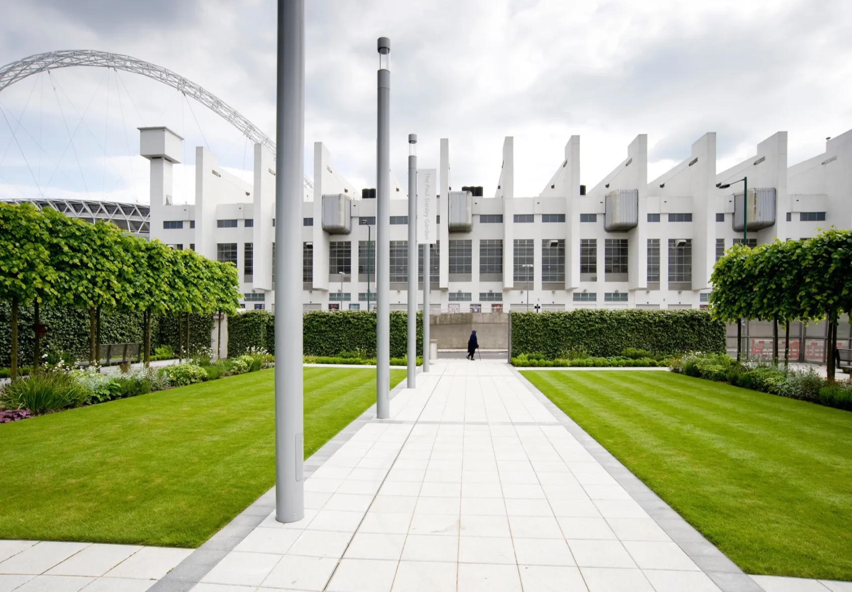 Brent Civic Centre landscape design with pleached trees, formal lawns, and linear paving framing iconic Wembley architecture.