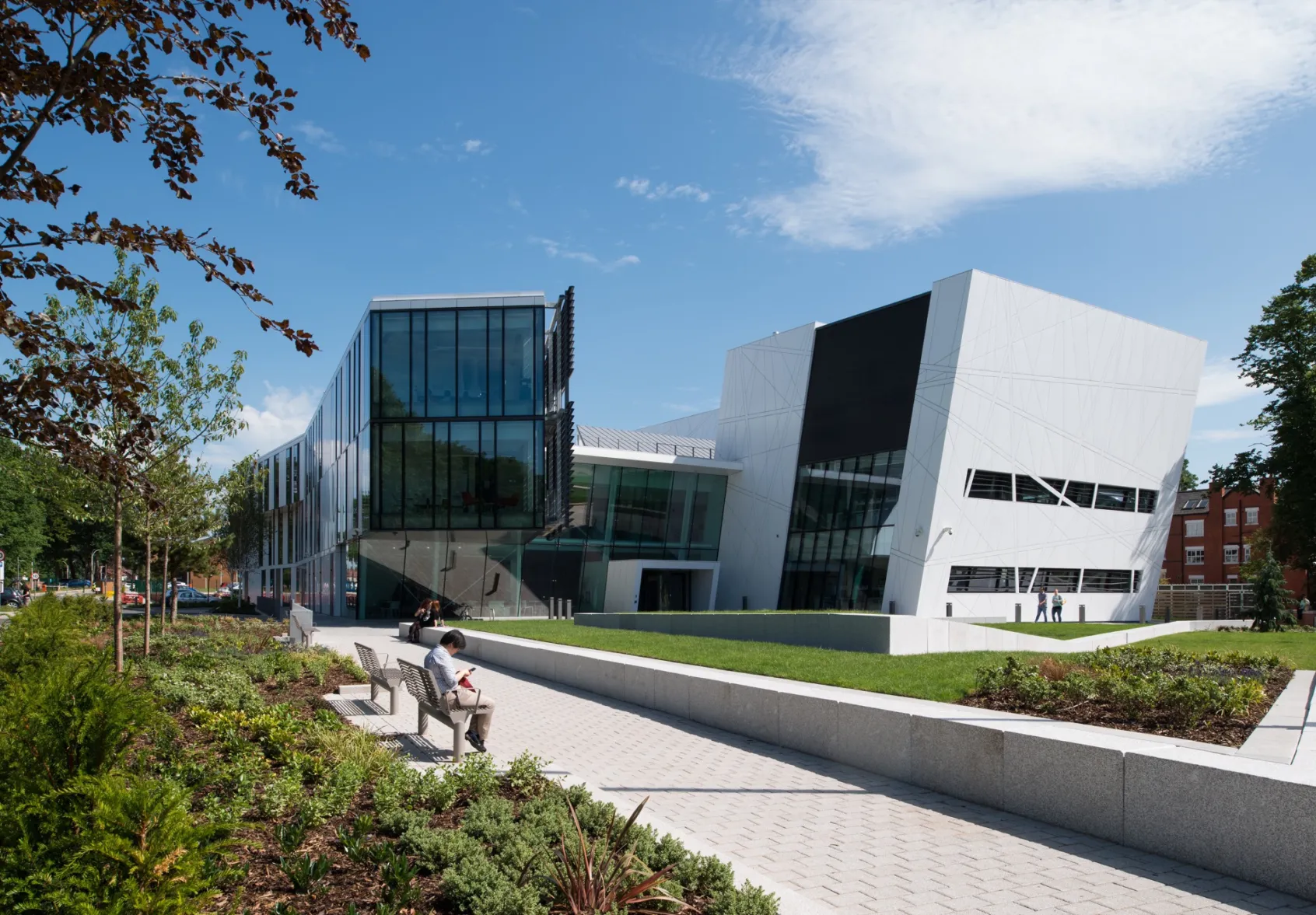 Manchester Cancer Research Centre landscape design with modern planting, accessible pathways, and sustainable urban green space.
