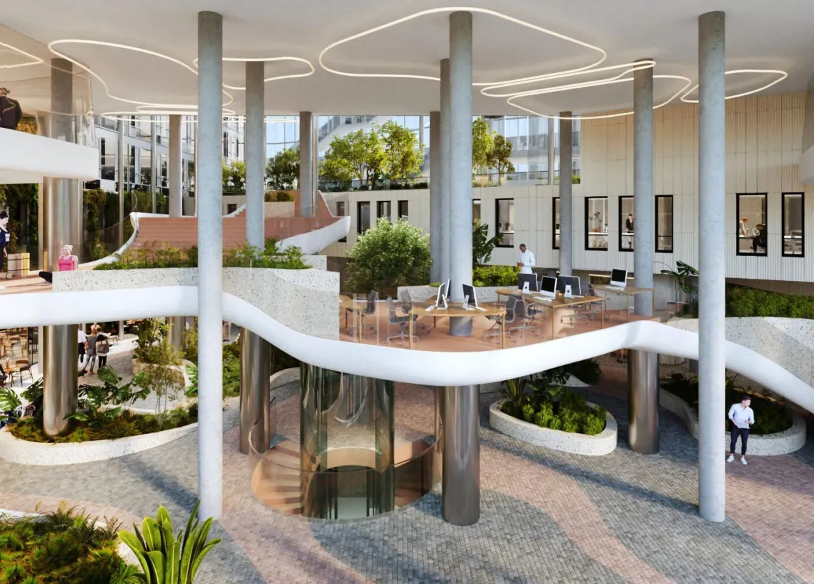 Interior of Danube House, an office development in Prague with lush internal planting, floating staircase and sculptural architectural design.