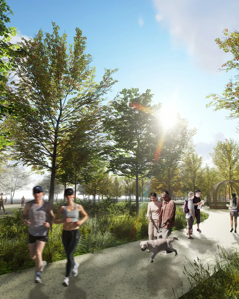 A shaded waterfront promenade framed by native planting and mature trees, encouraging walking, running and everyday social life along the river