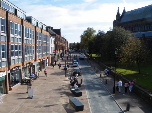 Carlisle Town Centre streetscape with pedestrian-friendly design, seating, paving, and landscape architecture enhancing urban public realm.