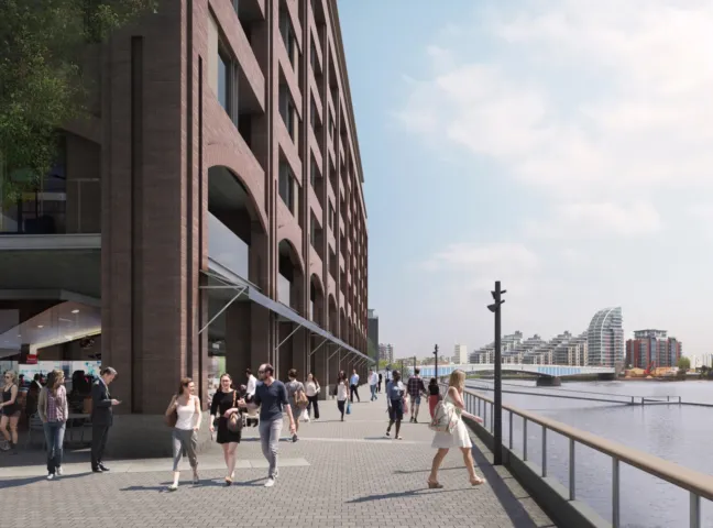Fulham Riverside public realm with riverside promenade, pedestrian-friendly design, and mixed-use landscape architecture in London.