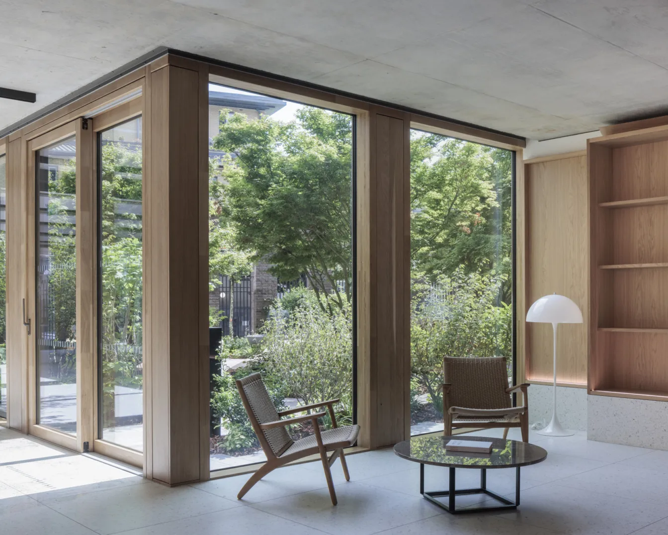 Coworking areas overlooking a landscaped courtyard