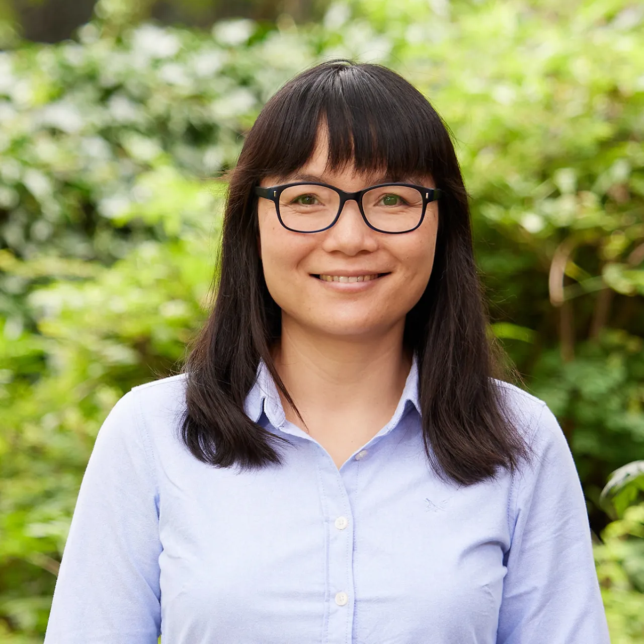 Lilianna Yu, Principal Urban Designer at Gillespies' Leeds studio, smiling in a parkland setting
