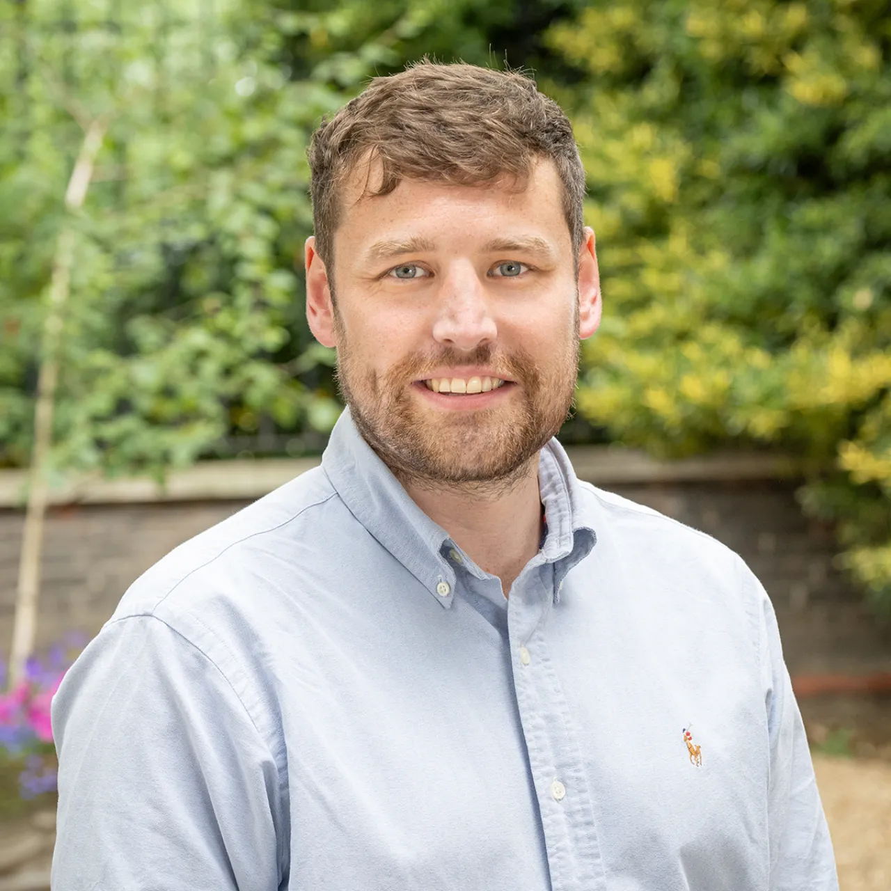 Cameron Heeley, Principal Landscape Architect at Gillespies' London studio, standing in an urban space