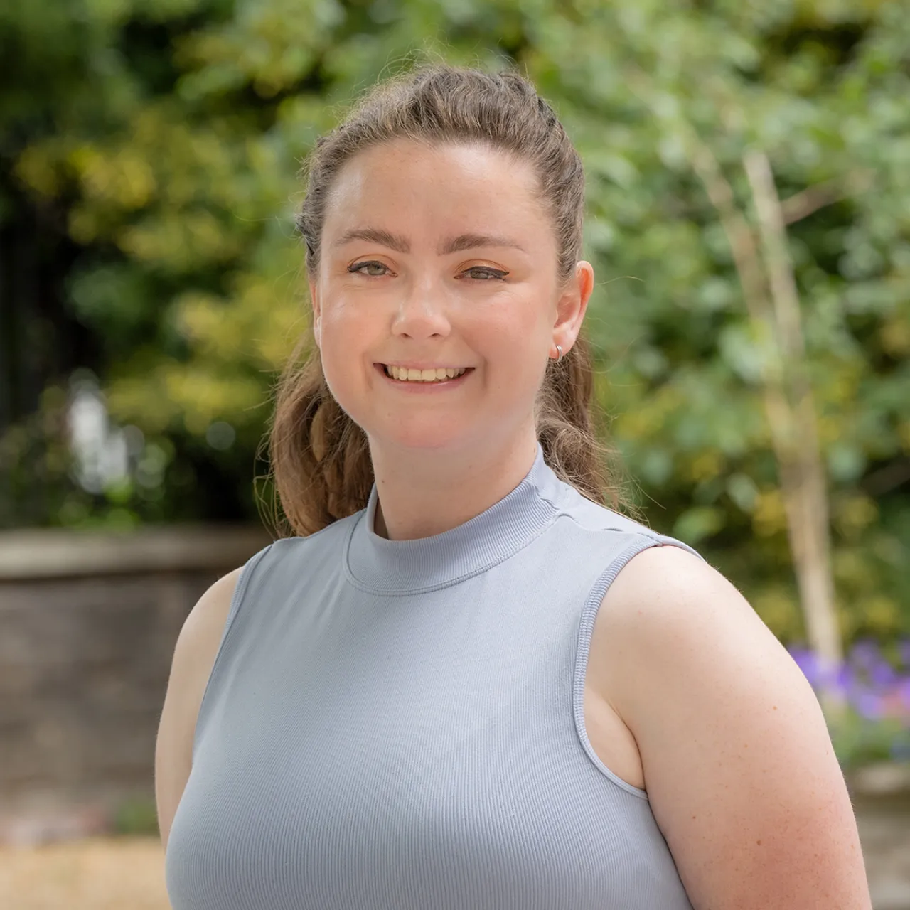 Emily Sutherland, Senior Landscape Architect at Gillespies' London studio, standing in an urban setting