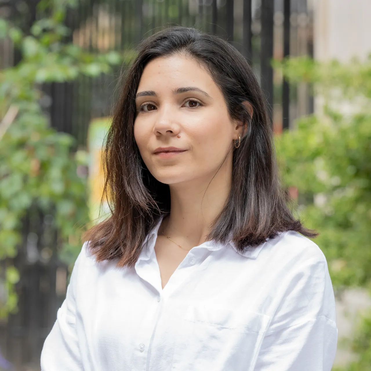 Izel Besikci, Senior Landscape Architect in Gillespies' London studio, smiling in a parkland setting