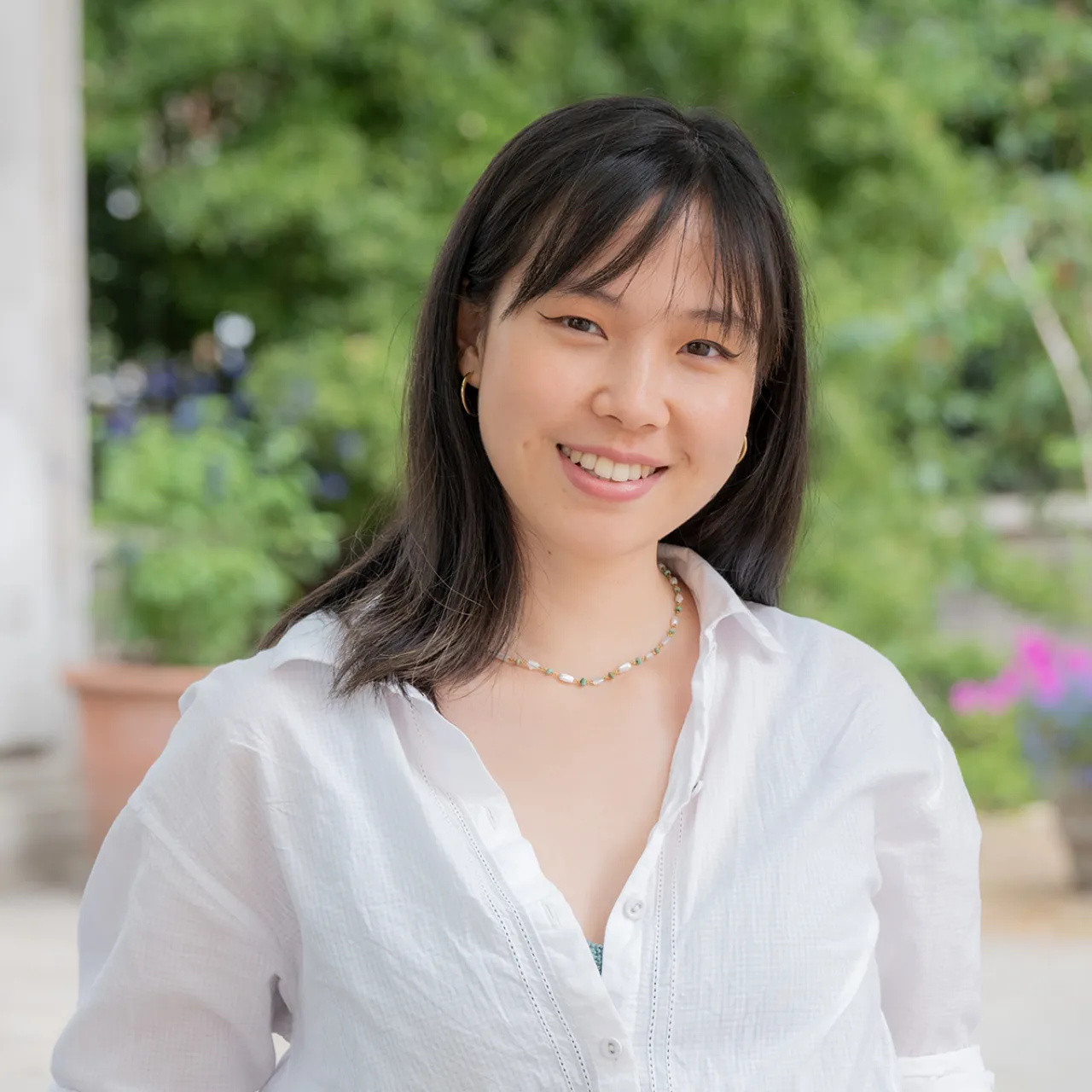 Teresa Carmelita, Landscape Architect at Gillespies' London studio, standing in an urban setting