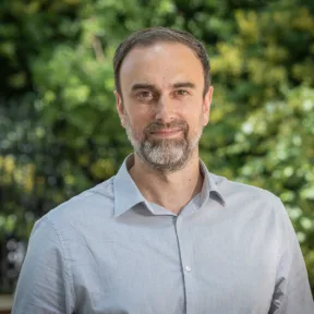 Armel Mourgue, Partner and Landscape Architect at Gillespies' London studio, standing in a parkland setting